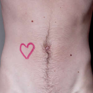 Lipstick Heart on Man's Stomach